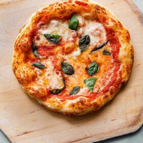Sourdough Pizza with Mozzarella, Tomato, and Basil