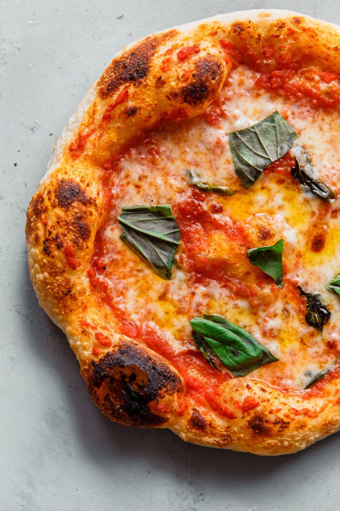 Baked Sourdough Pizza with Mozzarella Tomato and Basil