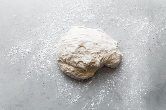 Sourdough Pizza Dough on Floured Surface