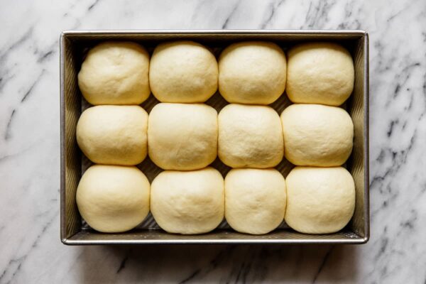 Proofed Dinner Rolls in Baking Dish