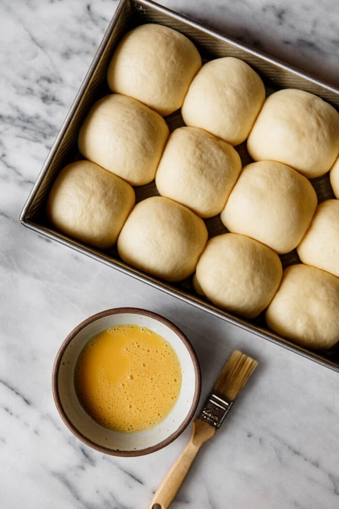 Dinner Rolls in Baking Pan with Egg Wash