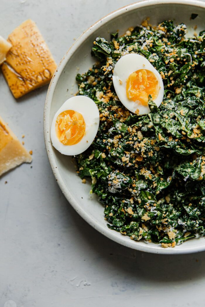 kale Caesar salad with hard boiled eggs