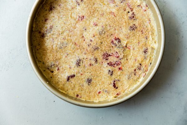 Raspberry Pistachio Cake Batter in Pan