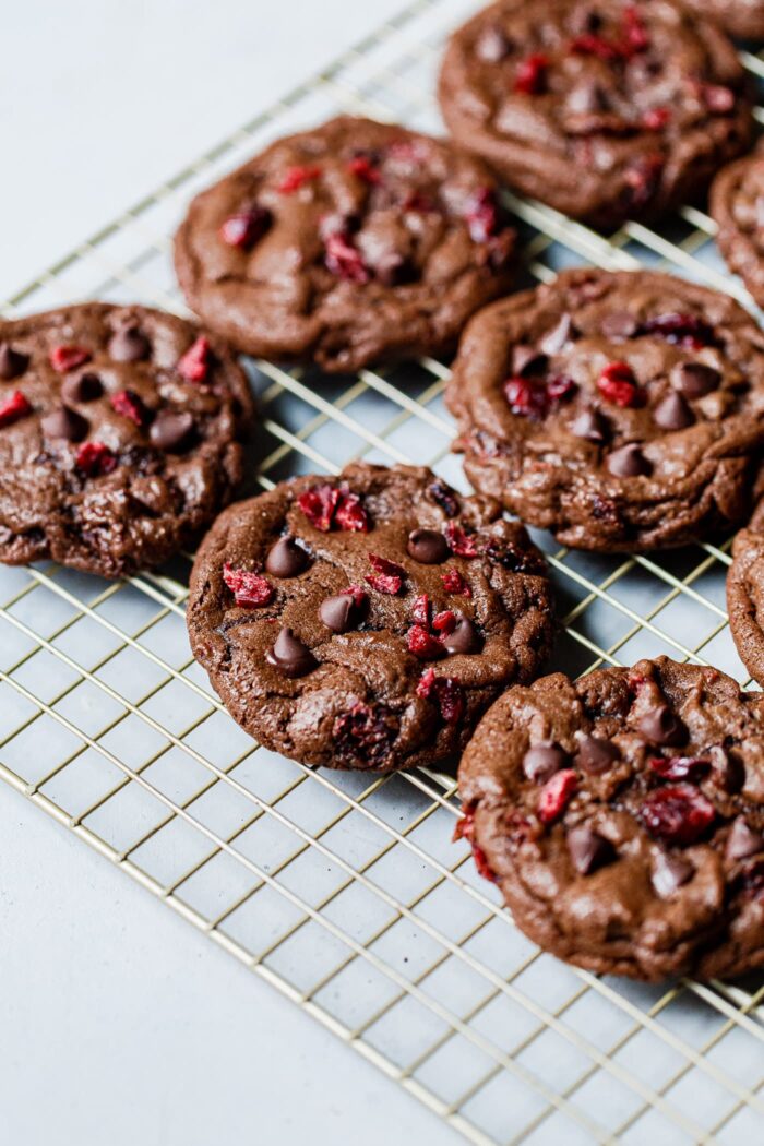 Chewy Chocolate Cookies with Cranberries on Rack