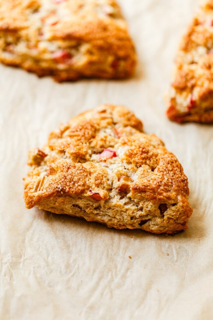 Baked Rhubarb Scones on Parchment Lined Baking Sheet