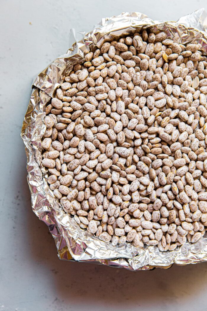 Lined Quiche Crust Filled with Beans and Foil