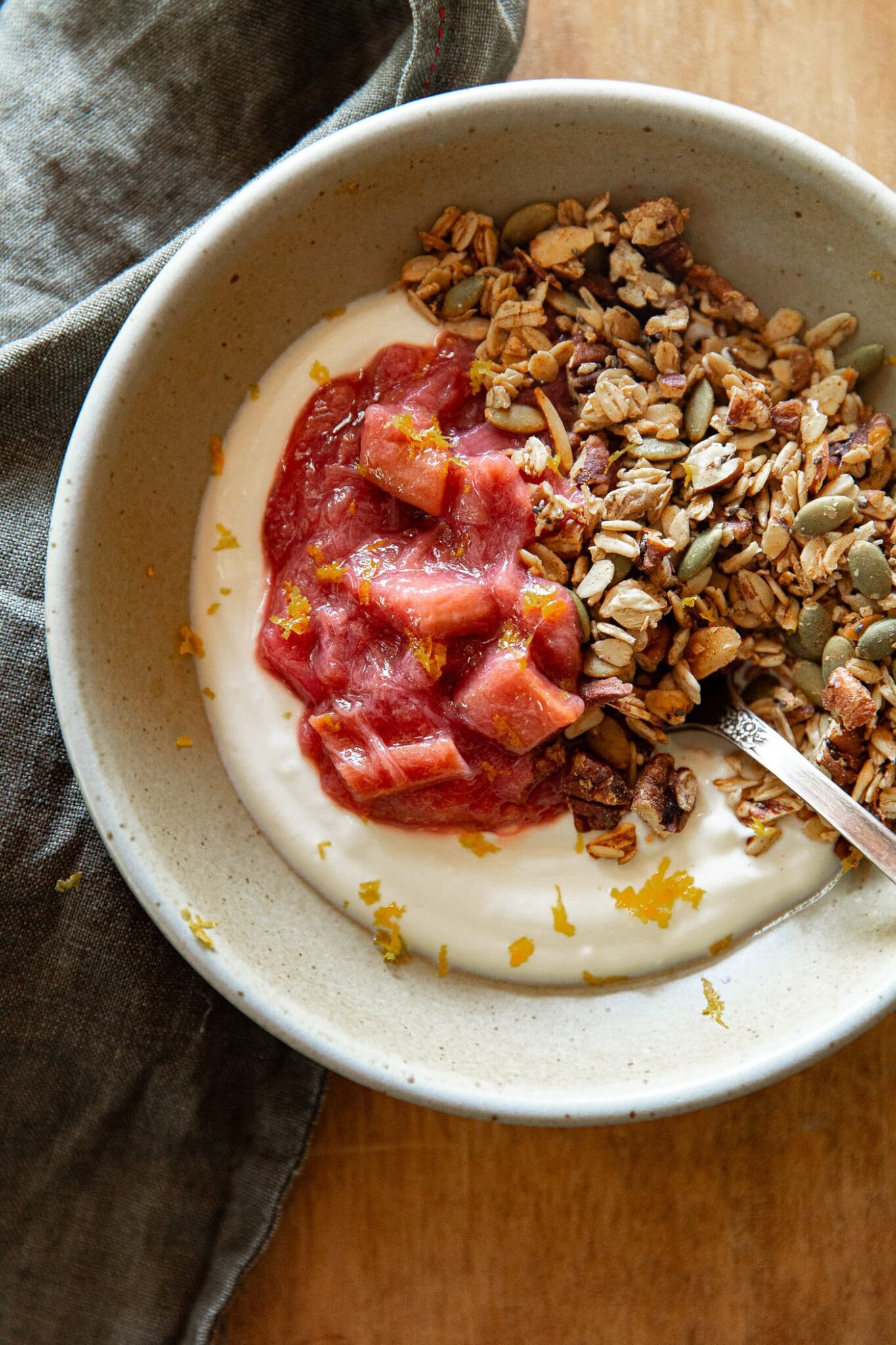 Rhubarb Compote with Yogurt and Granola in Bowl